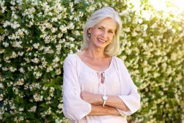 Older woman happy with urinary incontinence treatment Greater Manchester