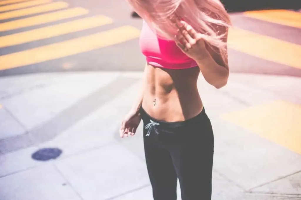 Woman with toned stomach after LA-EMS Body Sculpting Treatment Greater Manchester