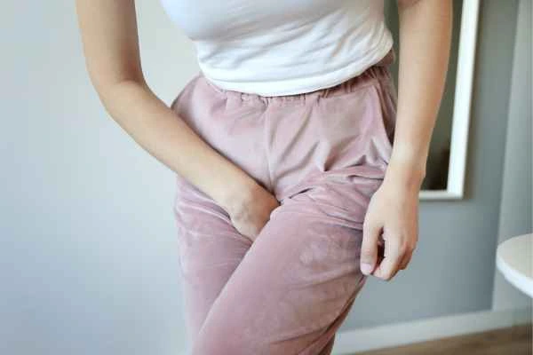 woman running for the toilet because of urinary incontinence Greater Manchester